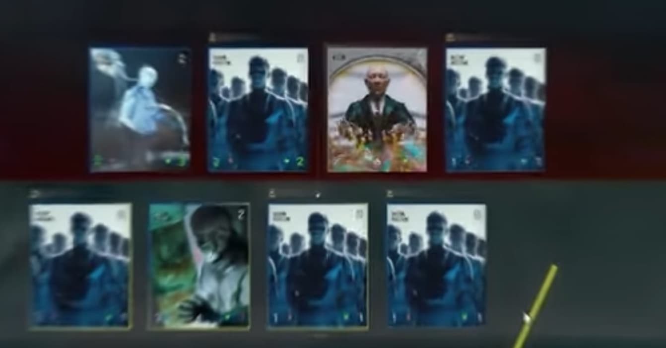 A blurry image showing several trading cards from a game