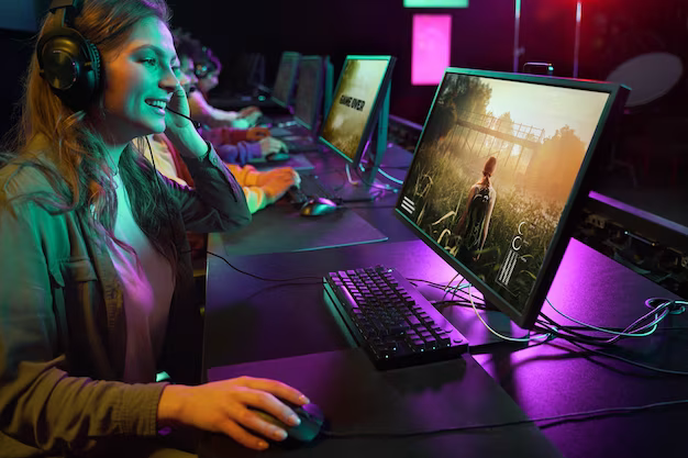 A girl wearing a headset plays in a gaming club